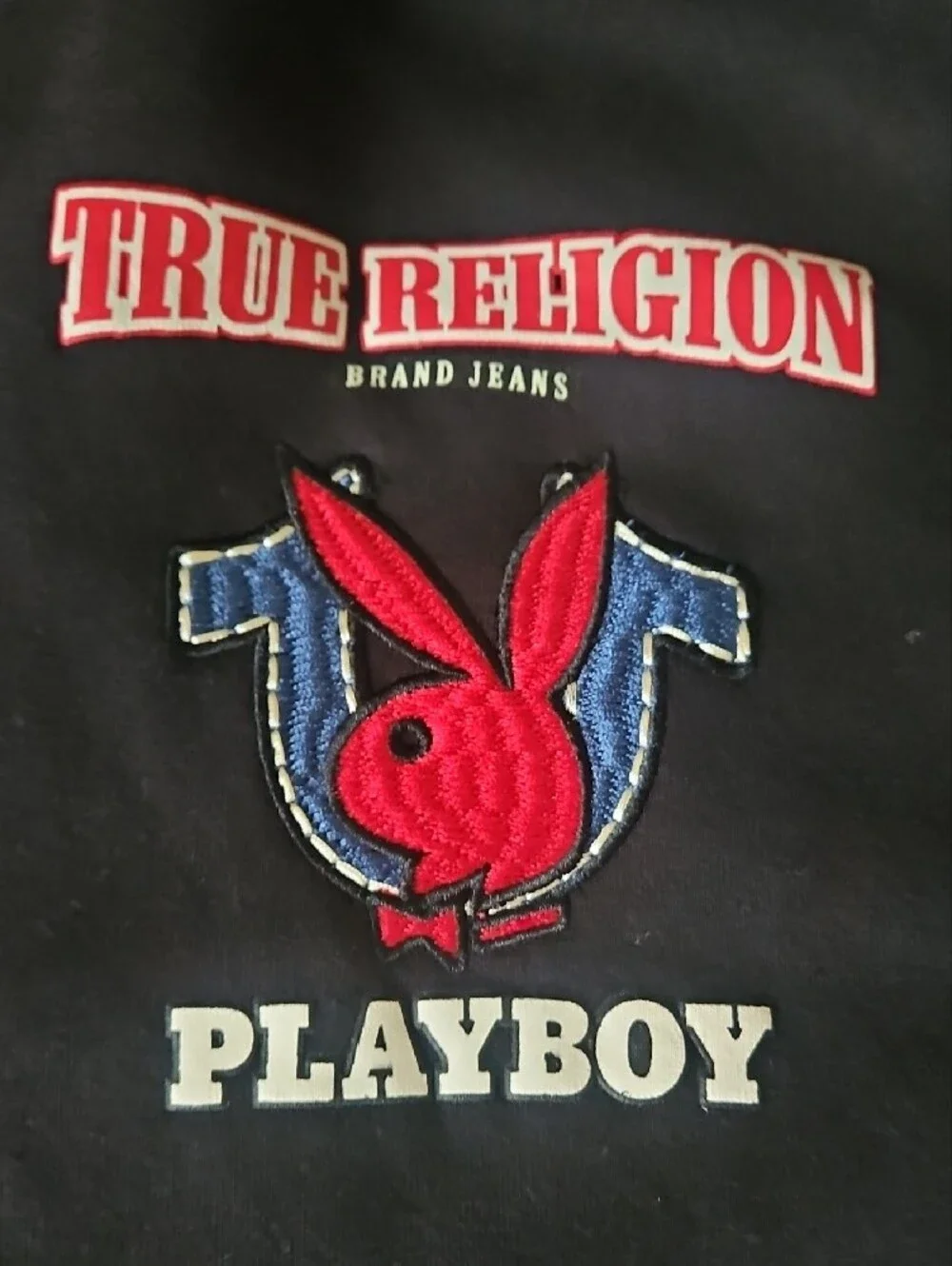 True Religion Black Zip-Up Hoodie with Iconic Blue & Red Bunnie Logo